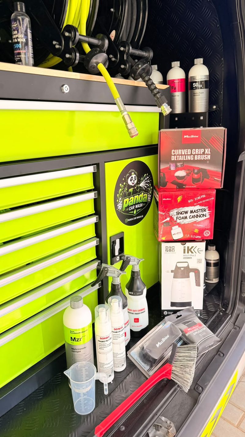 Inside the Panda van: lime tool cabinet with the Panda Car Wash sticker, hose reels, Koch-Chemie and Sonax products and a MaxShine foam cannon